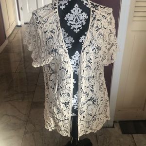 Crochet top w/ pearly buttons.